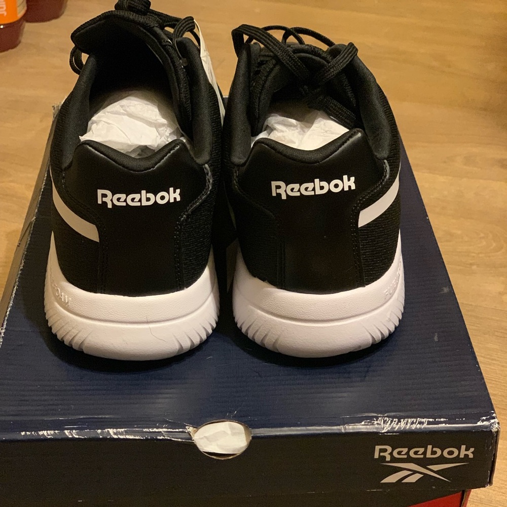 Brand new black Reeboks. Never worn.